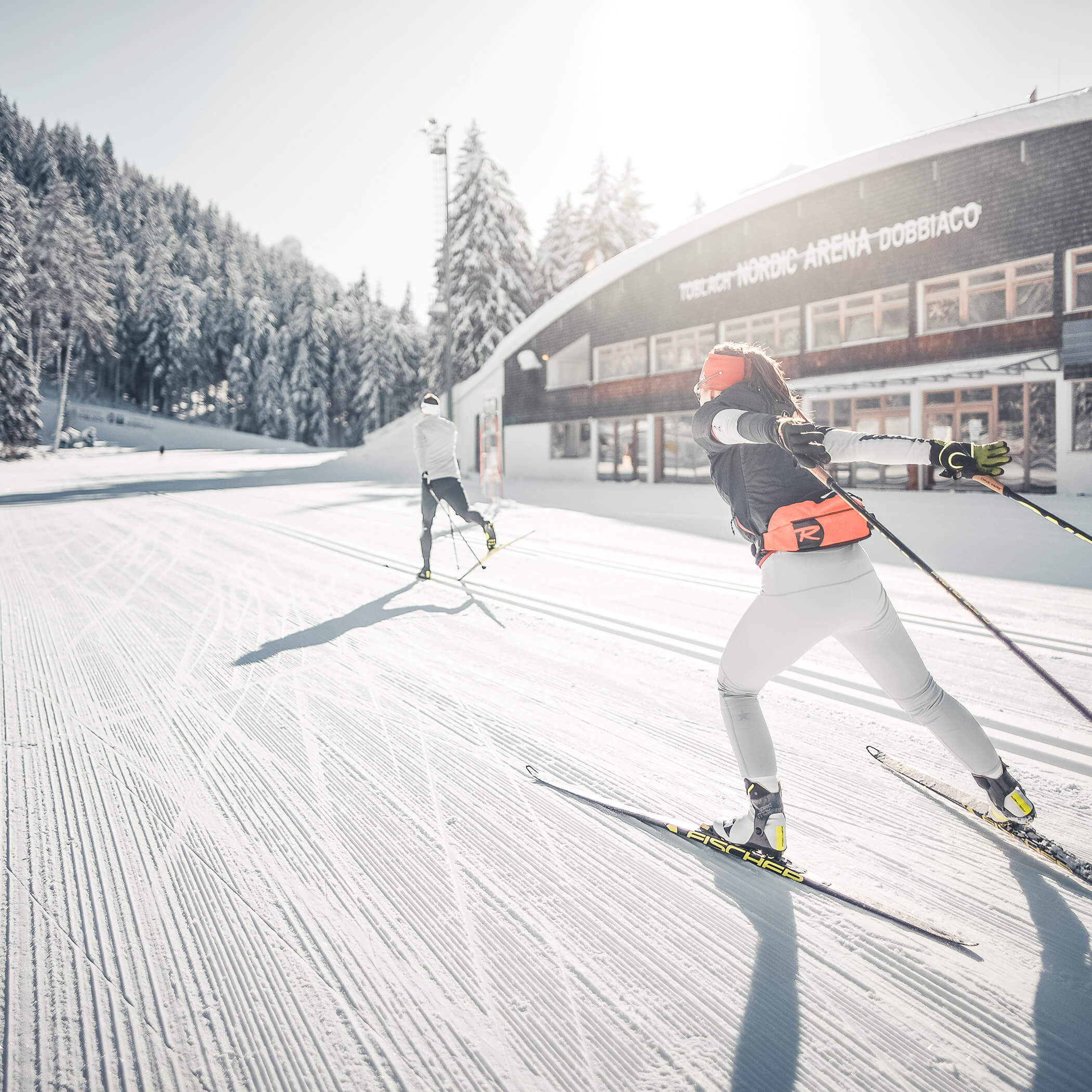 Zwei Langläufer auf der Loipe der Nordic Arena in Toblach - Laurin's