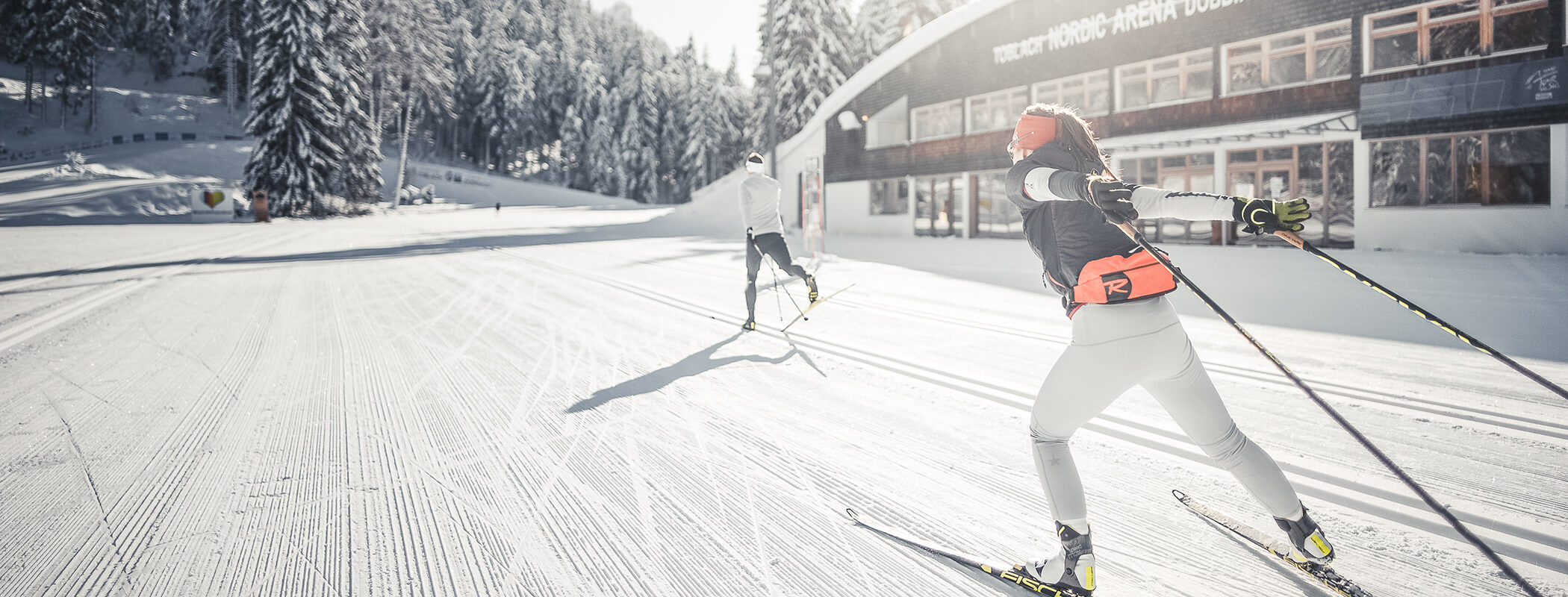 Zwei Langläufer auf der Loipe der Nordic Arena in Toblach - Laurin's