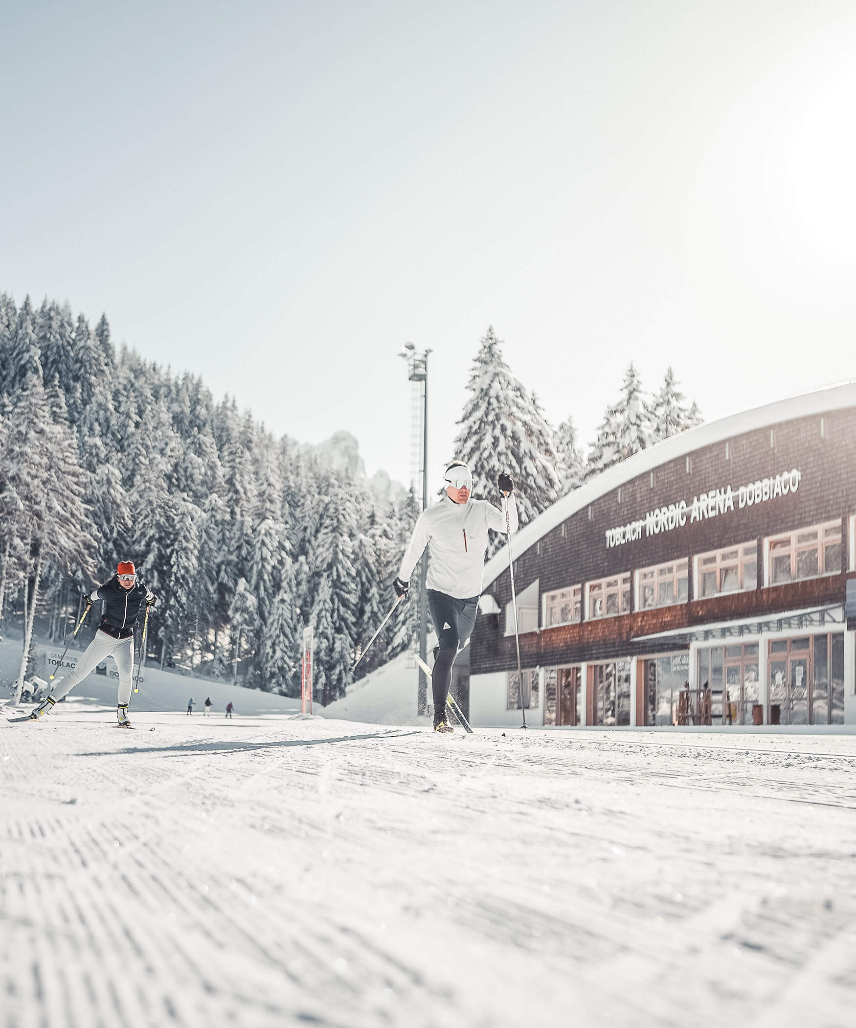 Zwei Langläufer auf der Loipe der Nordic Arena in Toblach - Laurin's